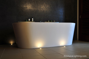 Bathtub with in-floor lighting